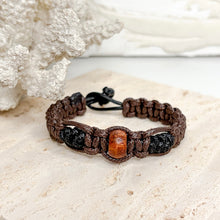 Load image into Gallery viewer, Unisex adjustable macramé bracelet with wooden beads in black and brown woven cord design