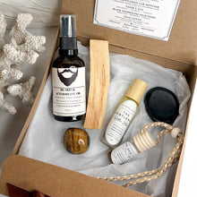 Load image into Gallery viewer, The Gentleman men’s gift pack with beard oil, essential oil roller, car diffuser, Tiger’s Eye, Black Tourmaline palm stone and Palo Santo by Soul Warrior Collective.