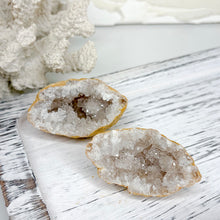 Load image into Gallery viewer, CLEAR QUARTZ CUT GEODE PAIR
